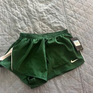 Dark green Nike running shorts